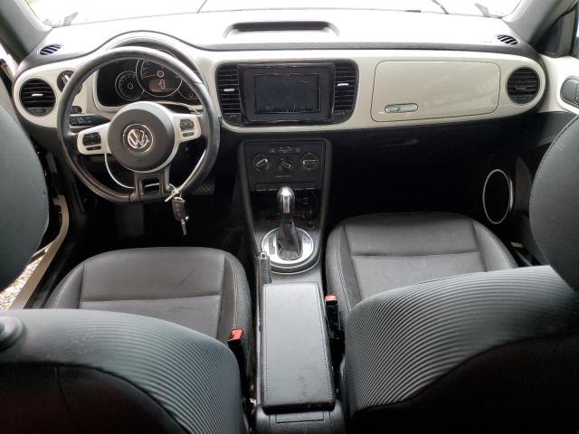 Photo 8 from auction – 2014 VOLKSWAGEN BEETLE with VIN 3VWJP7AT4EM618750
