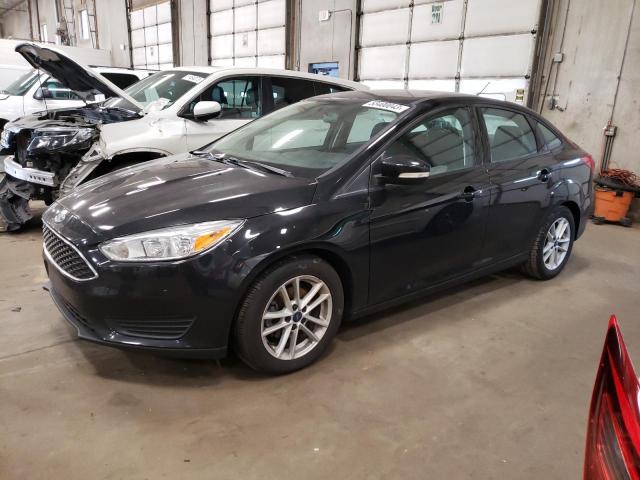 FORD FOCUS SE 2015 with VIN 1FADP3FE5FL220667 - Photo from auction