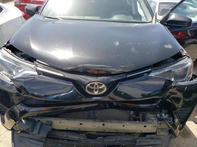 Photo 12 from auction – 2018 TOYOTA RAV4 LE with VIN 2T3ZFREV3JW446249