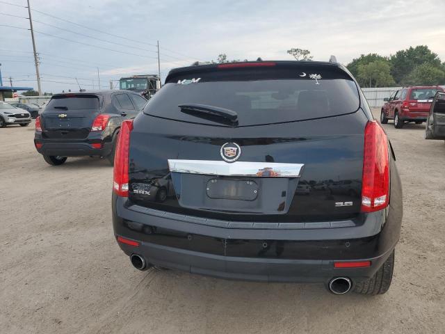 Photo 6 from auction – 2014 CADILLAC SRX PREMIU with VIN 3GYFNDE39ES556629