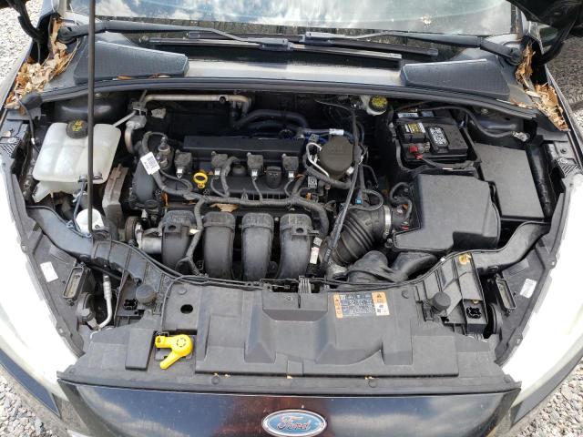 Photo 11 from auction – 2015 FORD FOCUS SE with VIN 1FADP3F24FL304680
