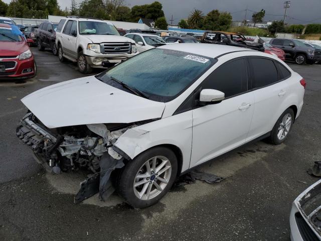 FORD FOCUS SE 2015 with VIN 1FADP3F28FL358449 - Photo from auction