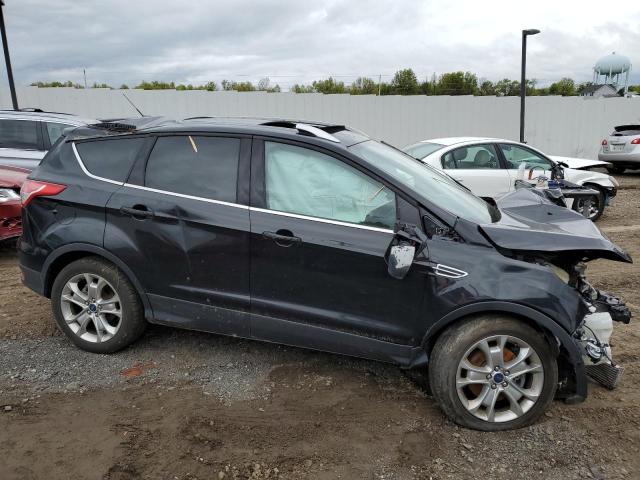 Photo 4 from auction – 2015 FORD ESCAPE TIT with VIN 1FMCU9J95FUC53847