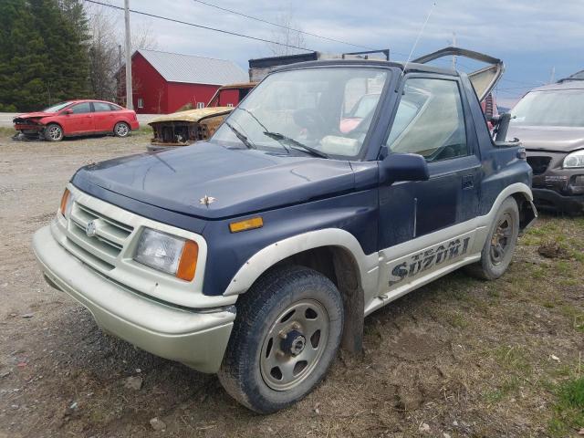 SUZUKI SIDEKICK J 1998 مع رقم تعريف المركبة 2S3TA02C9W6405261 - صورة من المزاد
