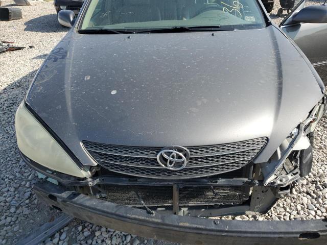 Photo 11 from auction – 2004 TOYOTA CAMRY LE with VIN 4T1BE30K14U928956