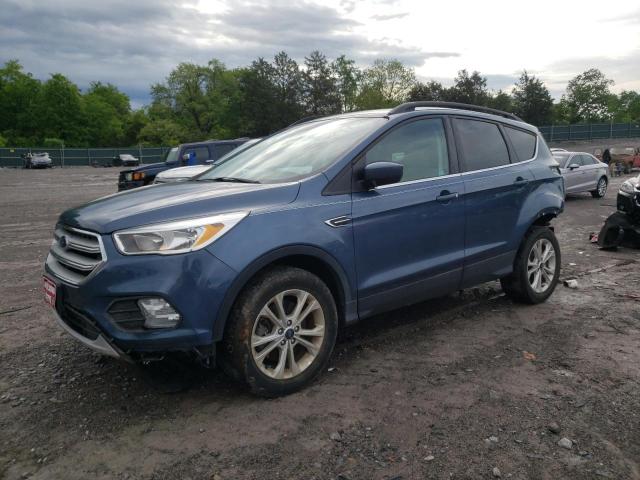 FORD ESCAPE SE 2018 with VIN 1FMCU9GD1JUB98544 - Photo from auction