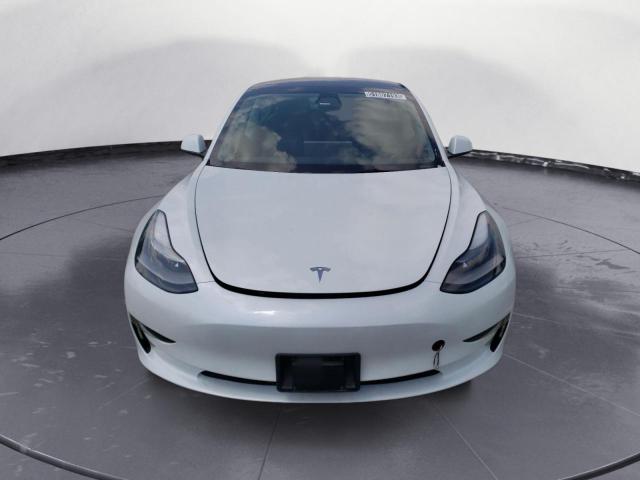 Photo 5 from auction – 2022 TESLA MODEL 3 with VIN 5YJ3E1EB0NF145188