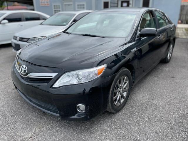Photo 2 from auction – 2011 TOYOTA CAMRY HYBR with VIN 4T1BB3EK7BU136891