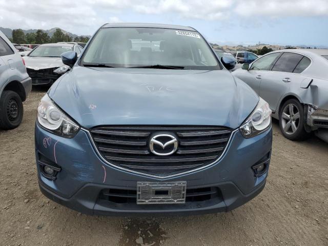 Photo 5 from auction – 2016 MAZDA CX-5 GT with VIN JM3KE2DY7G0888379