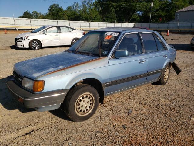 MAZDA 323 1987 with VIN JM1BF2229H0543330 - Photo from auction