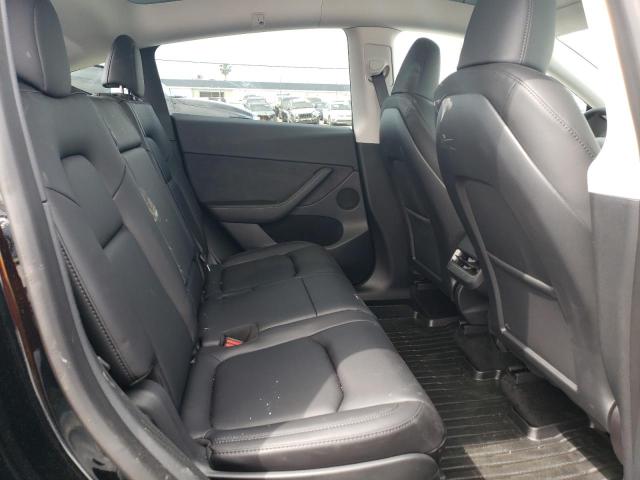 Photo 11 from auction – 2023 TESLA MODEL Y with VIN 7SAYGAEE8PF710433