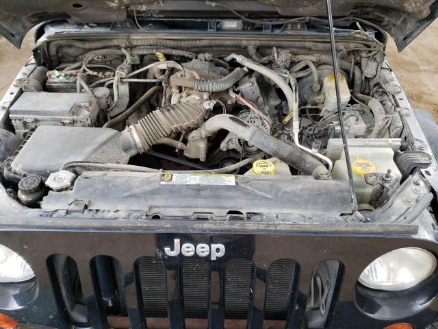 Photo 11 from auction – 2011 JEEP WRANGLER U with VIN 1J4BA5H16BL522336
