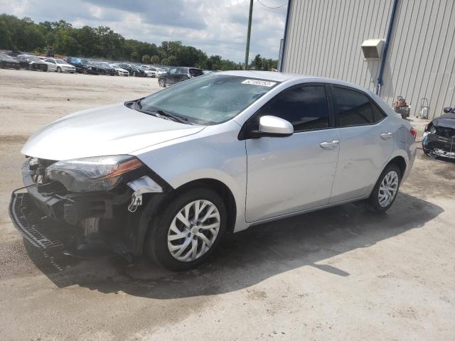 TOYOTA COROLLA L 2017 with VIN 5YFBURHE1HP613599 - Photo from auction
