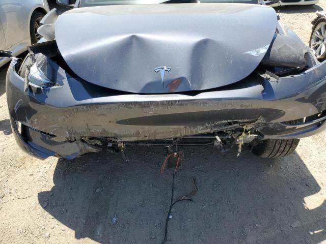 Photo 11 from auction – 2023 TESLA MODEL Y with VIN 7SAYGDEE0PF619951