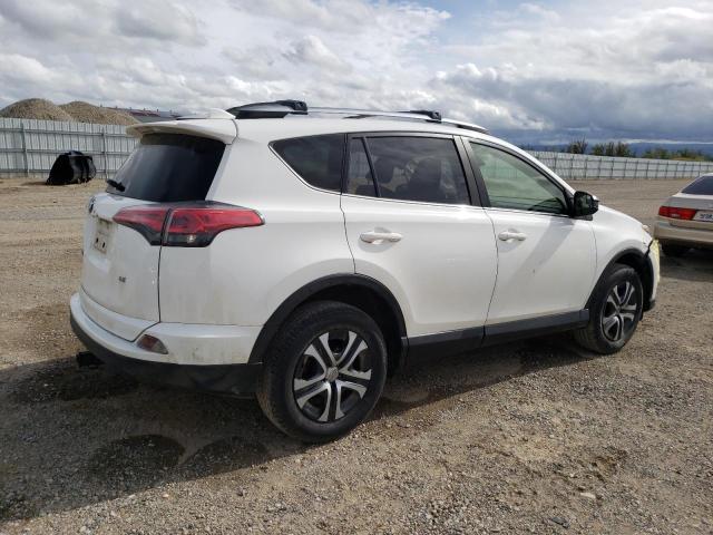 Photo 3 from auction – 2018 TOYOTA RAV4 LE with VIN JTMZFREV2JD129446
