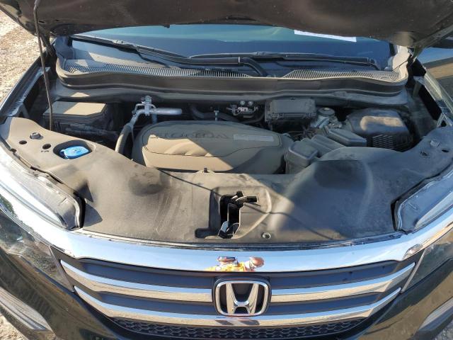 Photo 11 from auction – 2018 HONDA PILOT LX with VIN 5FNYF5H10JB020232