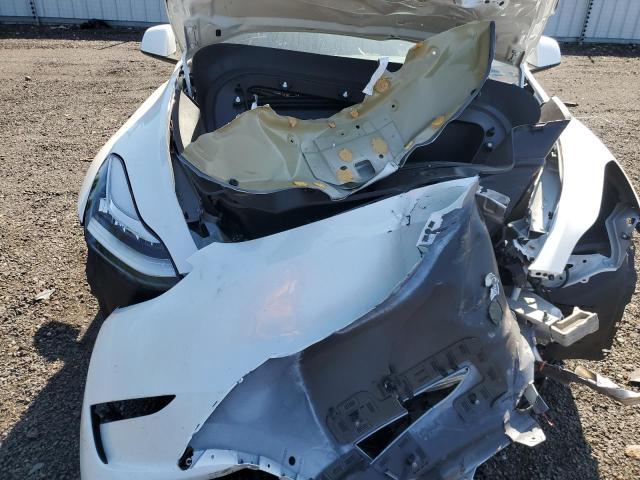 Photo 11 from auction – 2022 TESLA MODEL Y with VIN 7SAYGDEE0NA022552