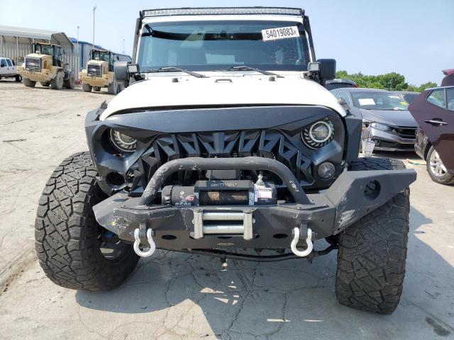 Photo 5 from auction – 2014 JEEP WRANGLER U with VIN 1C4BJWDG9EL176325
