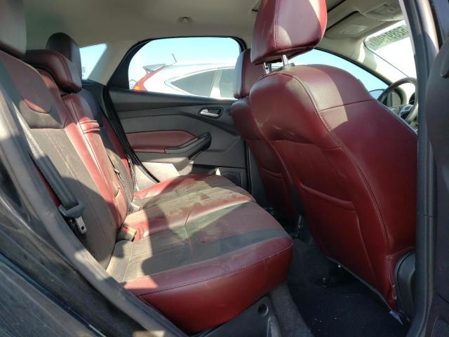 Photo 10 from auction – 2014 FORD FOCUS TITA with VIN 1FADP3N22EL321302