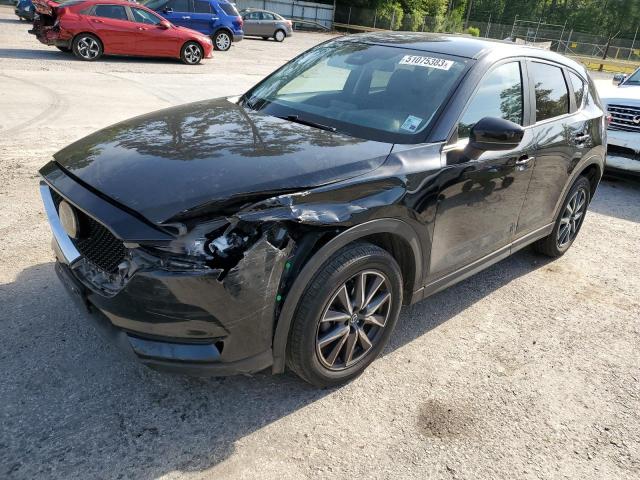 MAZDA CX-5 TOURI 2018 with VIN JM3KFACM7J1347419 - Photo from auction