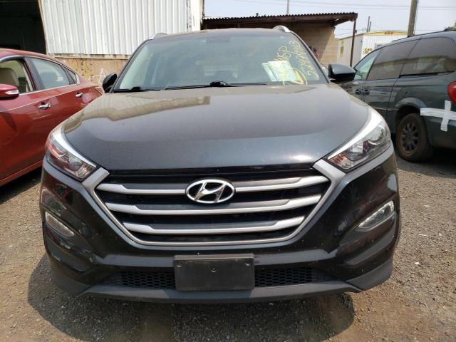 Photo 5 from auction – 2017 HYUNDAI TUCSON LIM with VIN KM8J3CA46HU260109