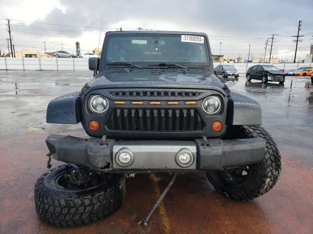Photo 5 from auction – 2013 JEEP WRANGLER U with VIN 1C4BJWDG9DL601959