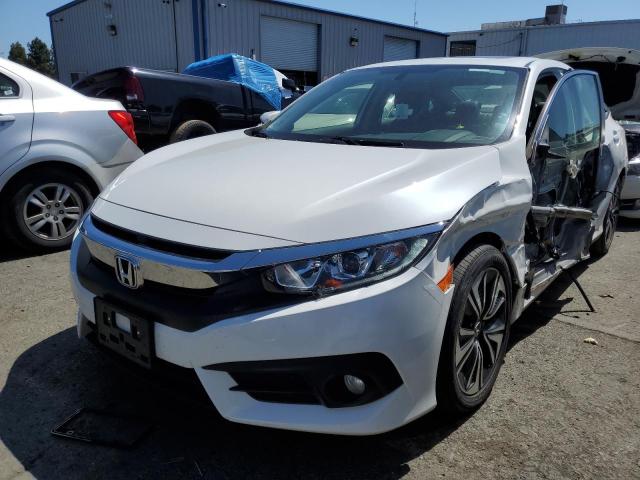 HONDA CIVIC EXL 2018 with VIN JHMFC1F71JX025377 - Photo from auction