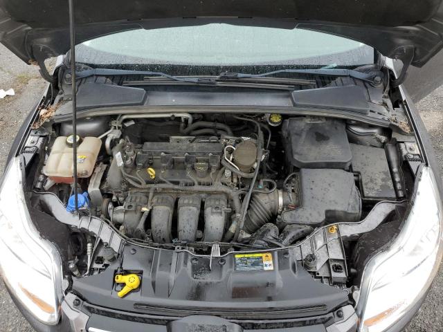 Photo 11 from auction – 2012 FORD FOCUS SE with VIN 1FAHP3F22CL372893
