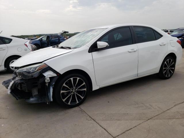 TOYOTA COROLLA L 2018 with VIN 5YFBURHE3JP763459 - Photo from auction