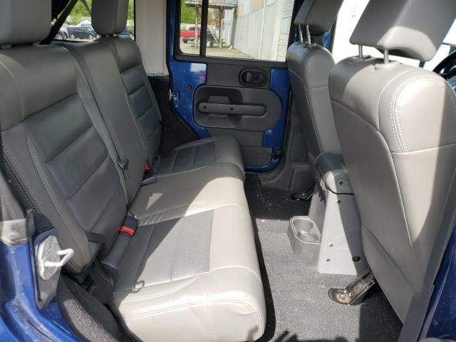Photo 11 from auction – 2010 JEEP WRANGLER U with VIN 1J4BA5H19AL110071
