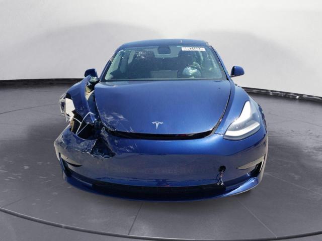 Photo 5 from auction – 2022 TESLA MODEL 3 with VIN 5YJ3E1EAXNF190601