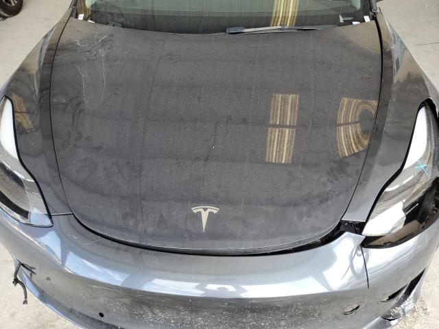 Photo 11 from auction – 2021 TESLA MODEL 3 with VIN 5YJ3E1EA0MF090375
