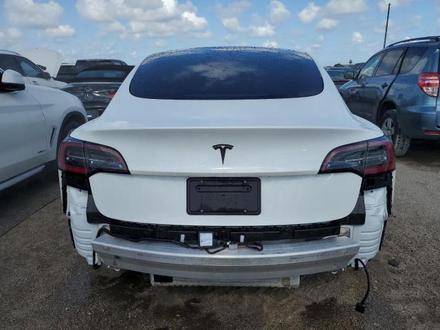 Photo 6 from auction – 2021 TESLA MODEL 3 with VIN 5YJ3E1EA3MF047214