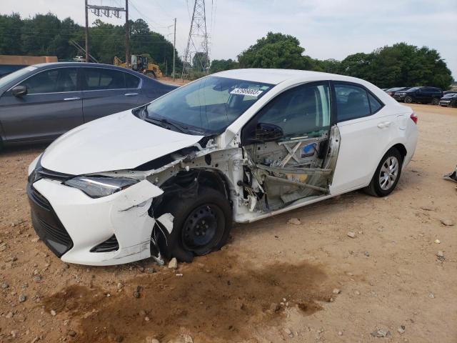 TOYOTA COROLLA L 2019 with VIN 5YFBURHE2KP877793 - Photo from auction