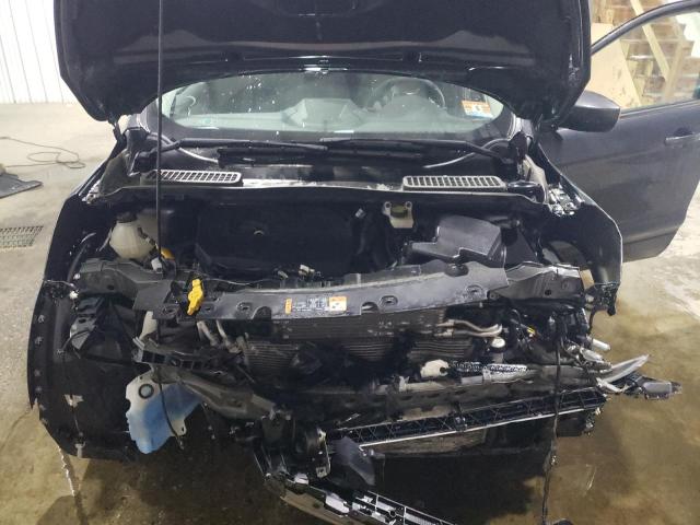 Photo 12 from auction – 2017 FORD ESCAPE SE with VIN 1FMCU0GD6HUD63767