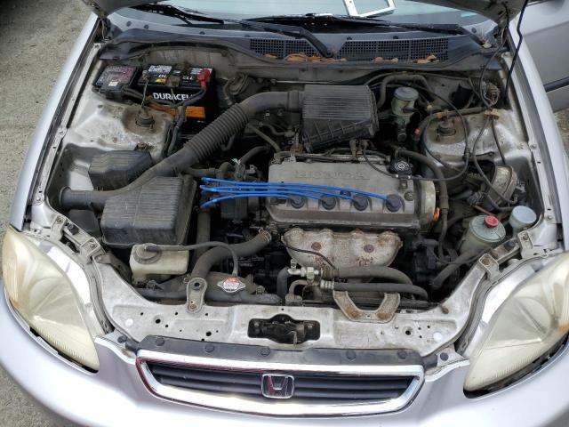 Photo 11 from auction – 1997 HONDA CIVIC LX with VIN JHMEJ6676VS034707