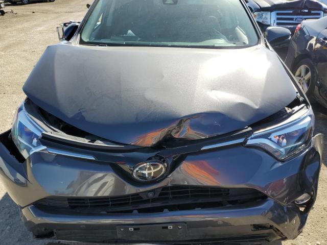 Photo 11 from auction – 2017 TOYOTA RAV4 LIMIT with VIN 2T3DFREV1HW666199