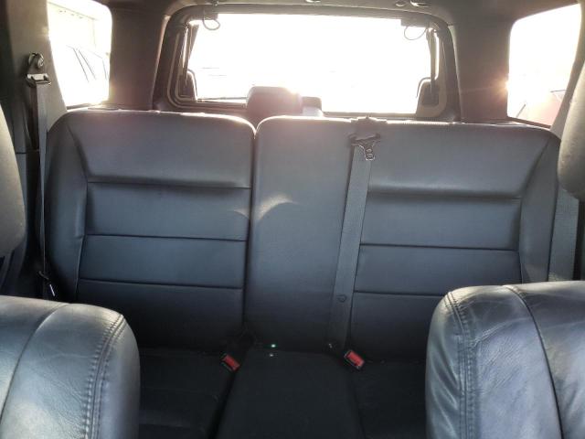 Photo 10 from auction – 2009 FORD ESCAPE LIM with VIN 1FMCU94G99KC49083