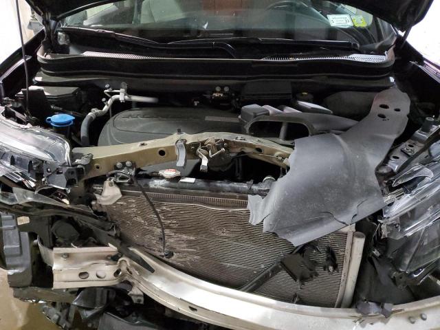 Photo 12 from auction – 2021 HONDA PILOT LX with VIN 5FNYF6H14MB009809