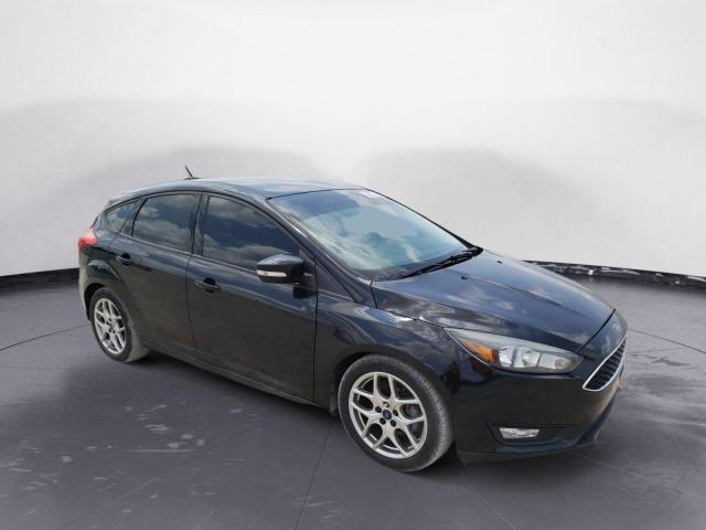 Photo 4 from auction – 2015 FORD FOCUS SE with VIN 1FADP3K20FL273076