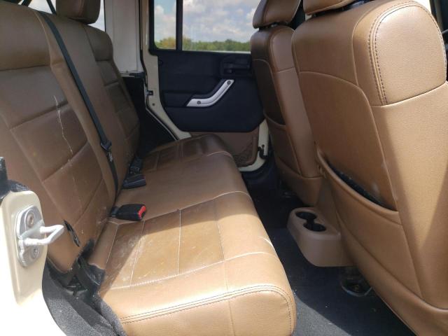 Photo 11 from auction – 2011 JEEP WRANGLER U with VIN 1J4BA5H15BL579451