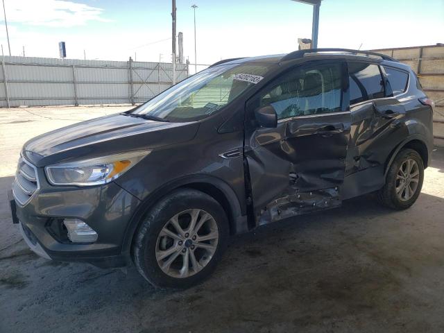 FORD ESCAPE SE 2018 with VIN 1FMCU0GD2JUA97203 - Photo from auction