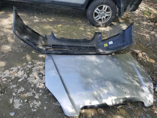 Photo 13 from auction – 2004 HONDA CR-V EX with VIN JHLRD78874C059116