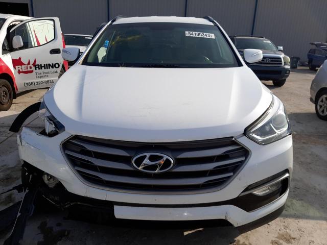 Photo 5 from auction – 2018 HYUNDAI SANTA FE S with VIN 5NMZU3LB8JH075864