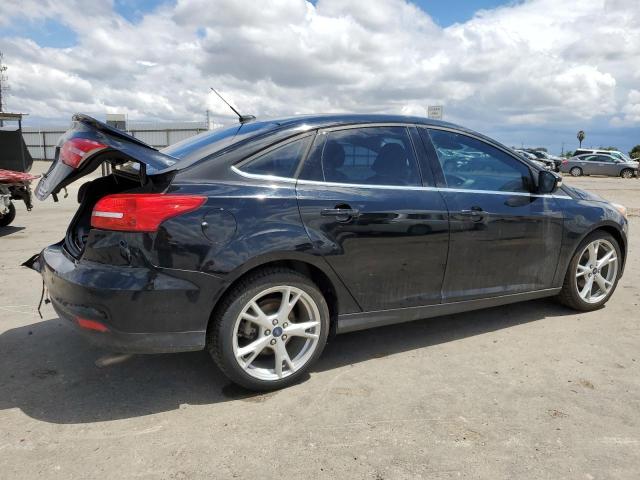 Photo 3 from auction – 2016 FORD FOCUS TITA with VIN 1FADP3J22GL282459