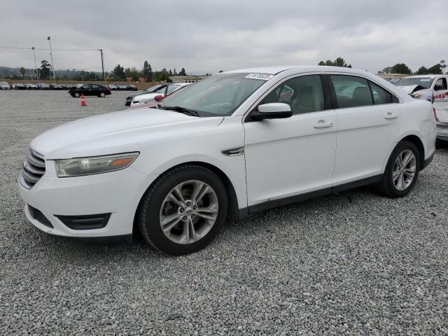FORD TAURUS SEL 2013 with VIN 1FAHP2E84DG101294 - Photo from auction