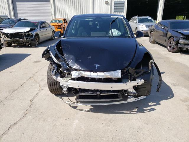 Photo 5 from auction – 2022 TESLA MODEL Y with VIN 7SAYGAEE7NF388820