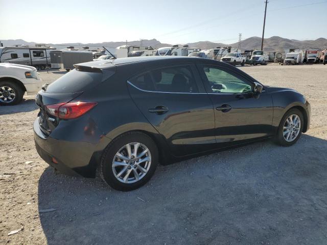 Photo 3 from auction – 2014 MAZDA 3 TOURING with VIN JM1BM1L78E1201464