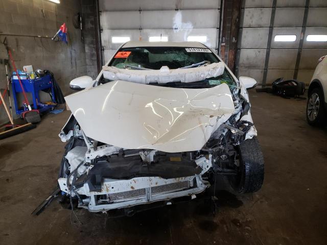 Photo 5 from auction – 2014 TOYOTA PRIUS C with VIN JTDKDTB34E1569859