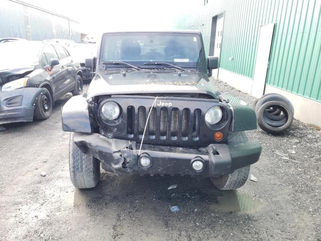 Photo 5 from auction – 2011 JEEP WRANGLER U with VIN 1J4BA7H15BL633309